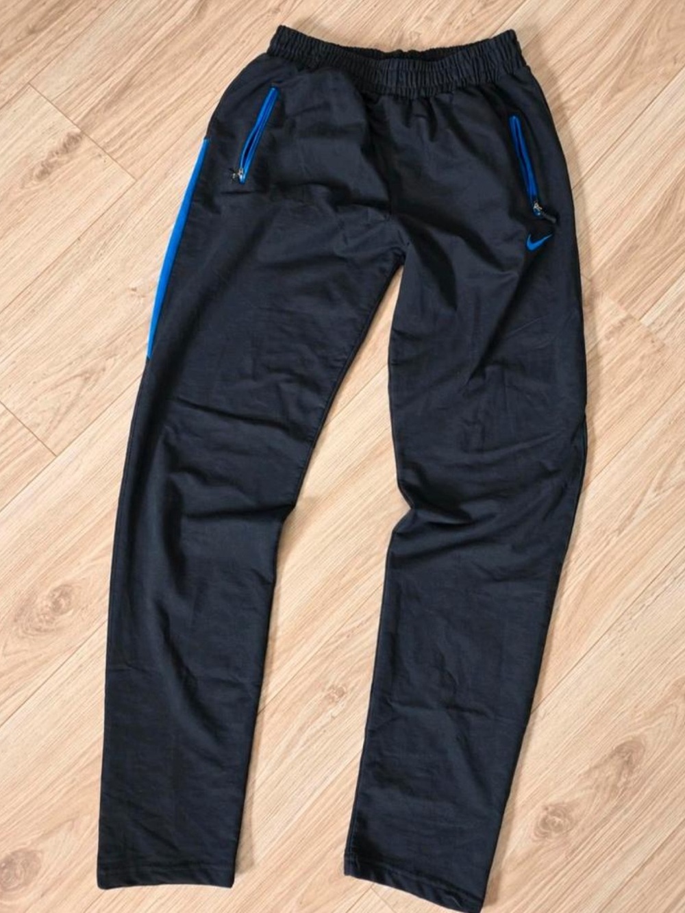 Nike Black Joggers with Blue Zip Accents